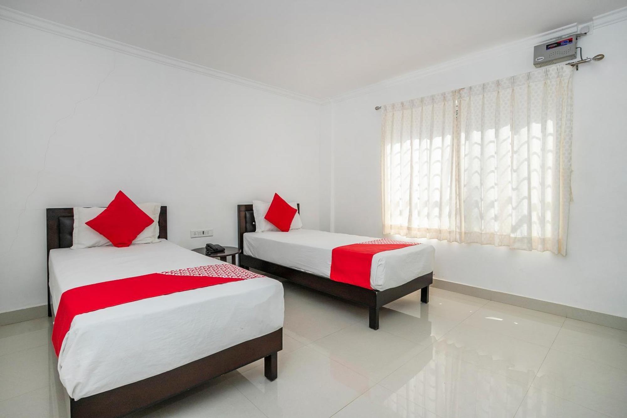 Hotel Collection O Cosmopolitan à Devanahalli Extérieur photo