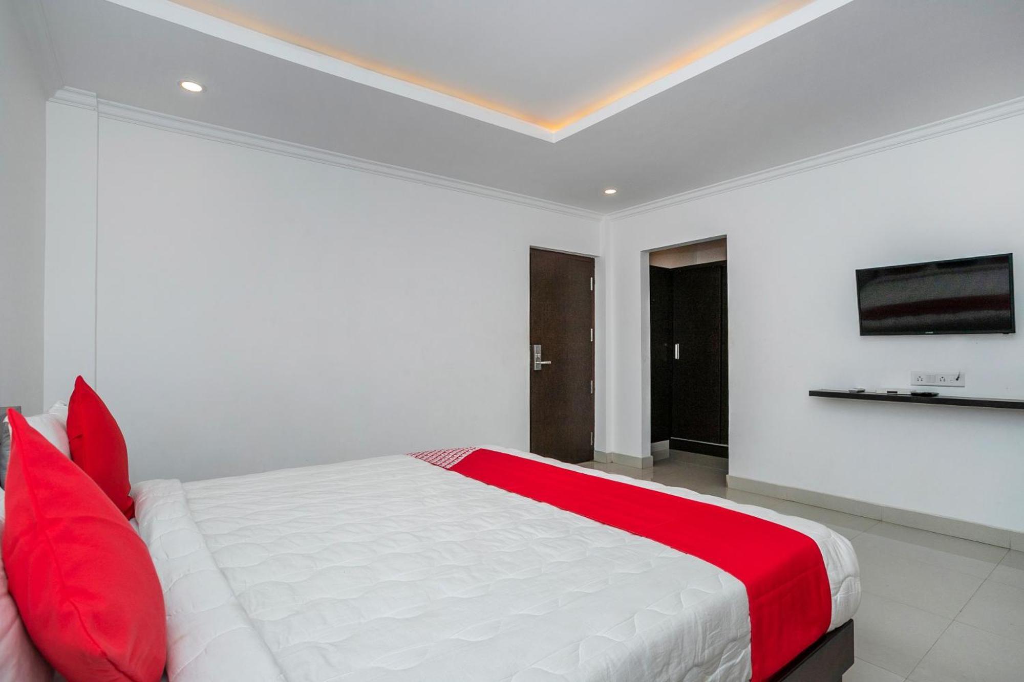 Hotel Collection O Cosmopolitan à Devanahalli Extérieur photo