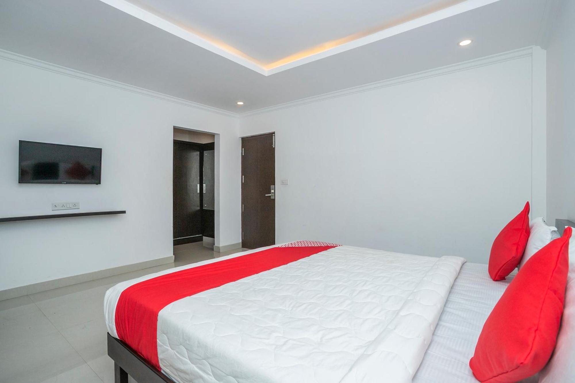 Hotel Collection O Cosmopolitan à Devanahalli Extérieur photo