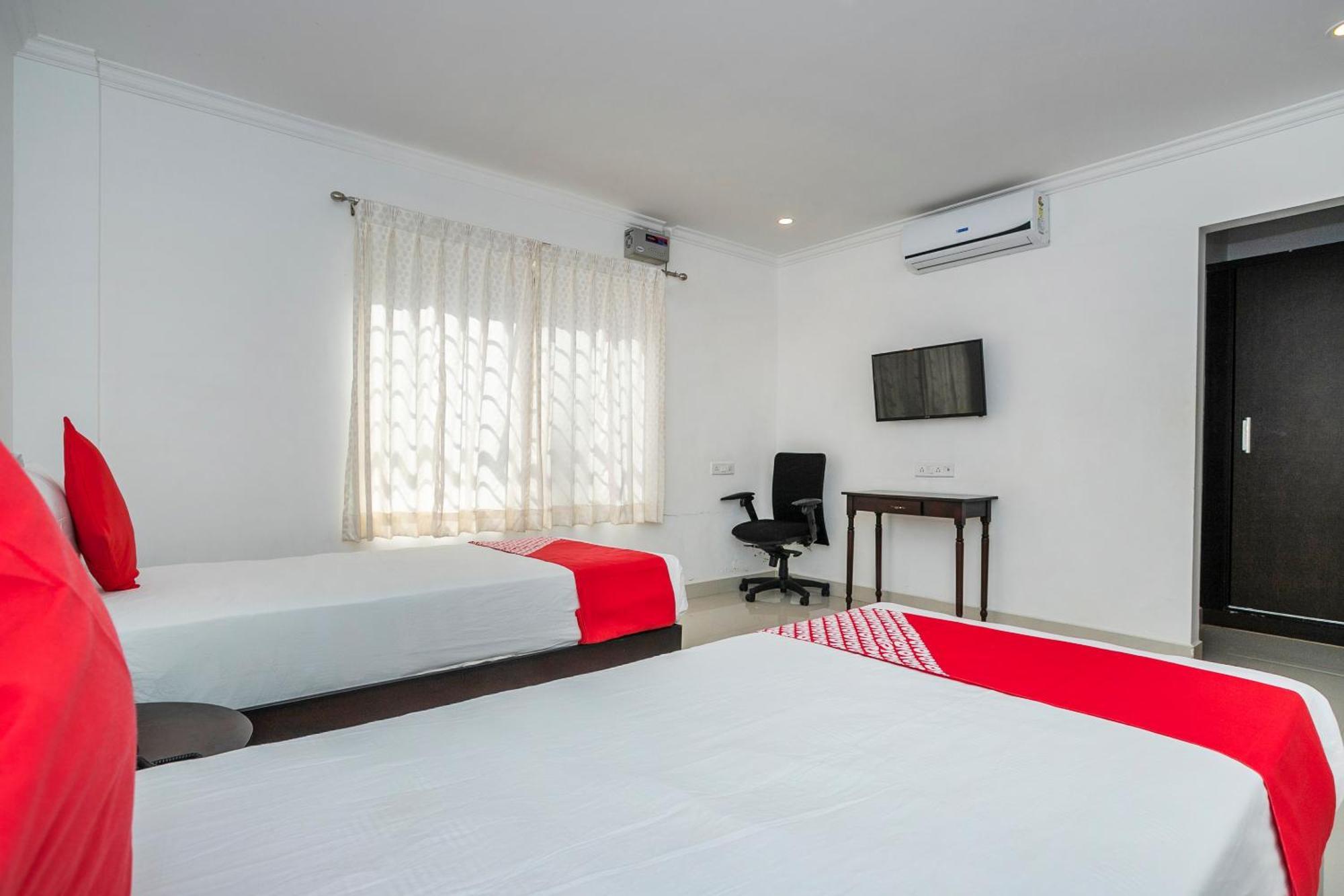 Hotel Collection O Cosmopolitan à Devanahalli Extérieur photo